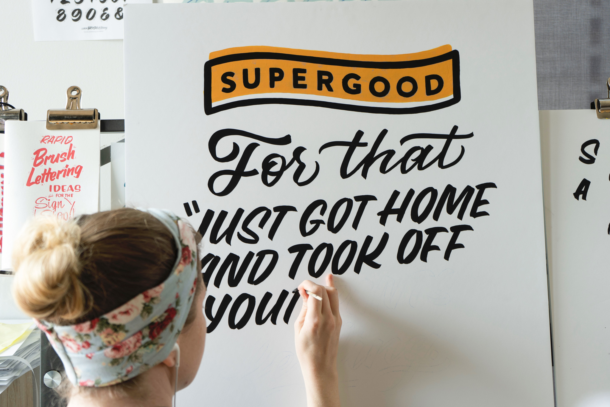 Hand painted sign for Supergood hemp custom painted by Hillery Powers