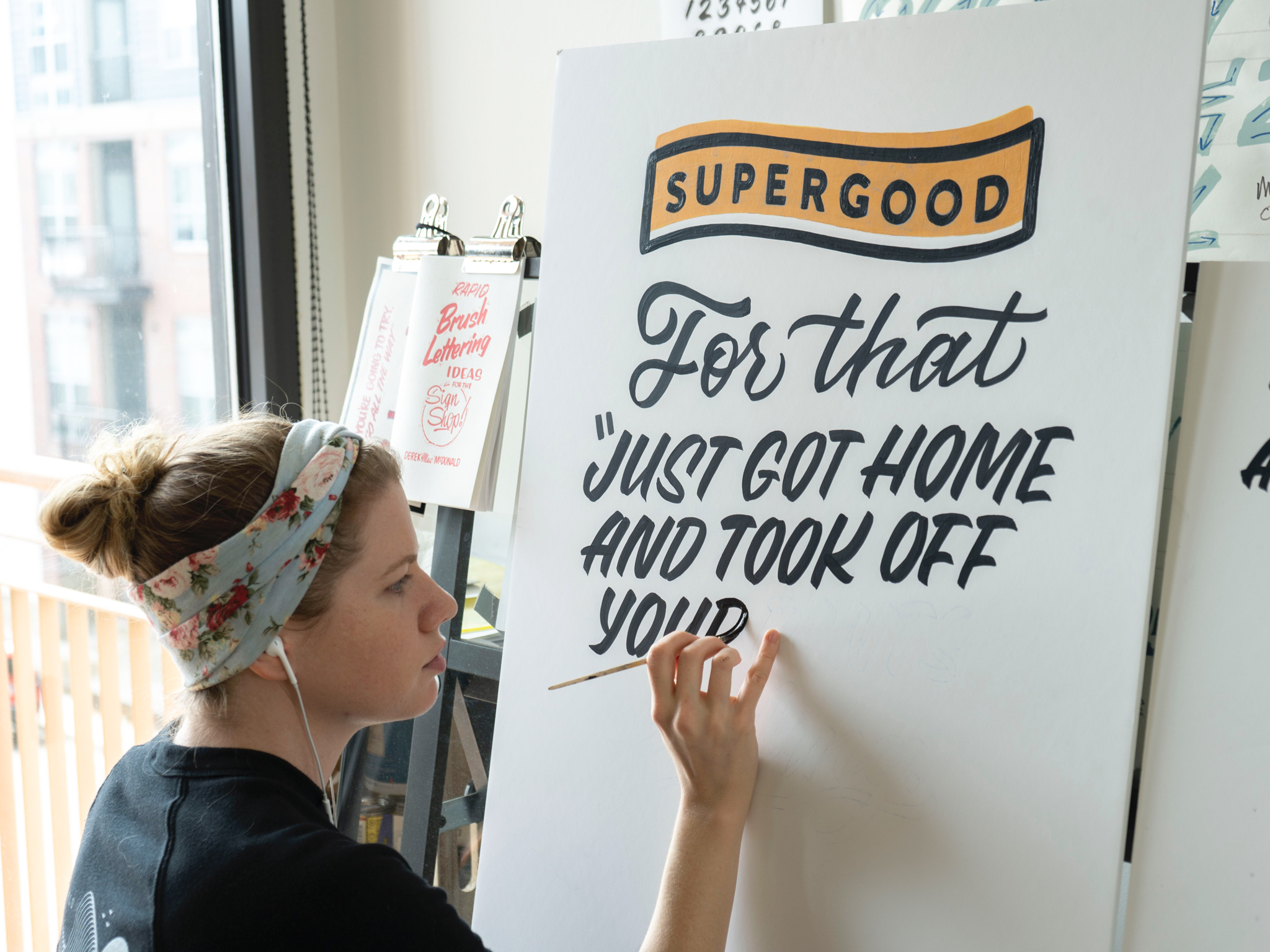 Hand painted sign for Supergood Hemp sign painted by Hillery Powers