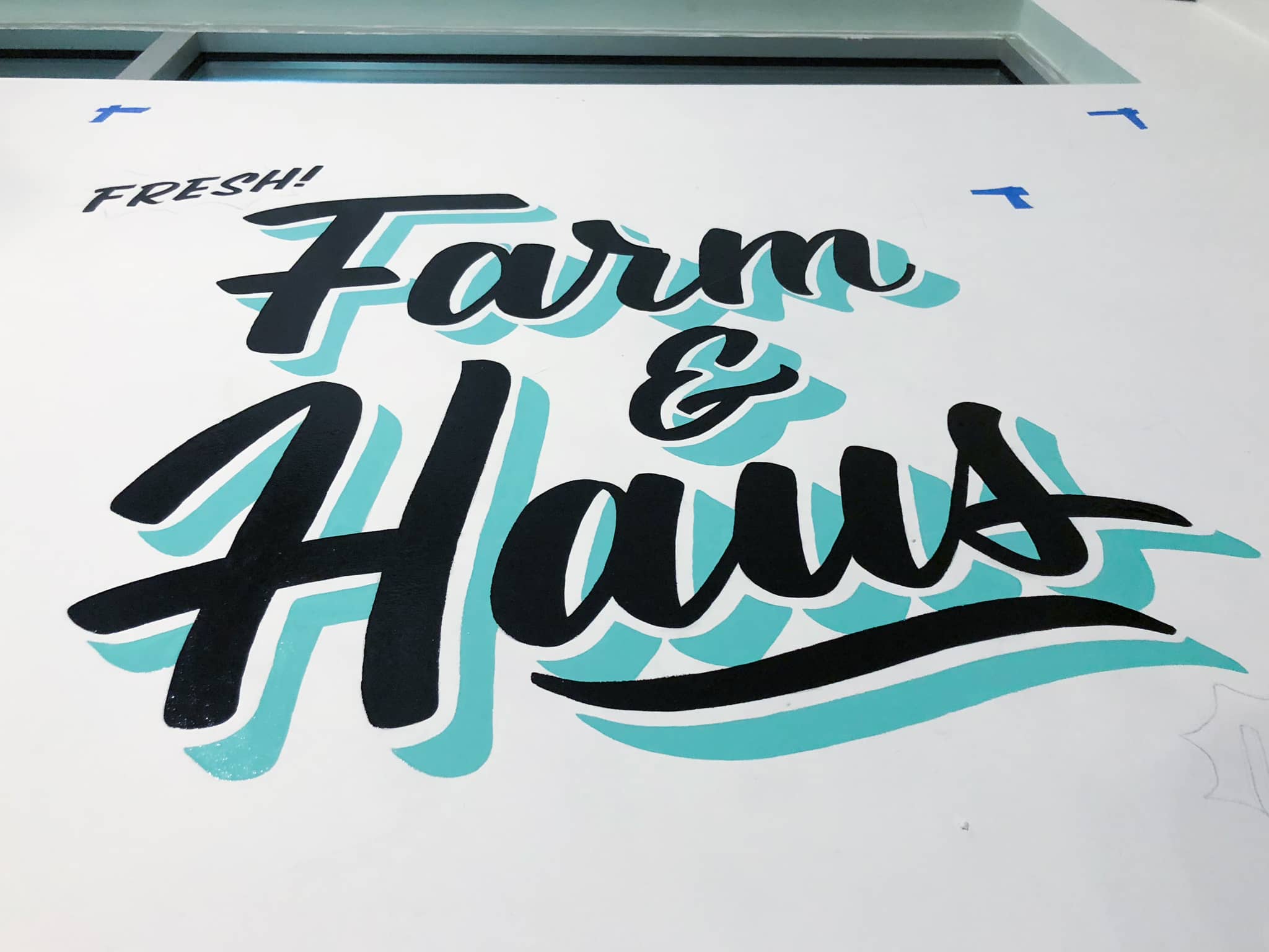 Farm & Haus hand lettered sign painted mural at East End Market by Hillery Powers
